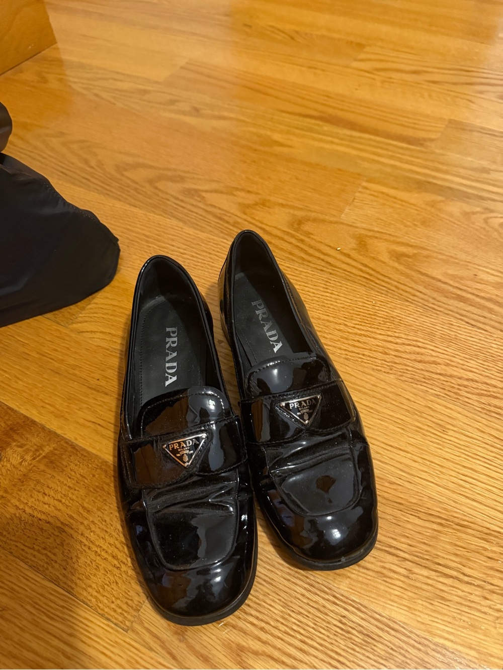 Prada Black Patent Leather Penny Loafers